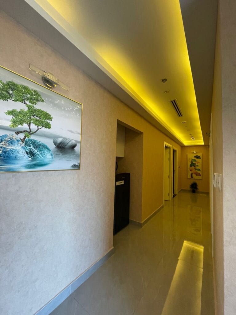 Luxury spa corridor with ambient lighting at Edhen Spa JBR Dubai Marina”